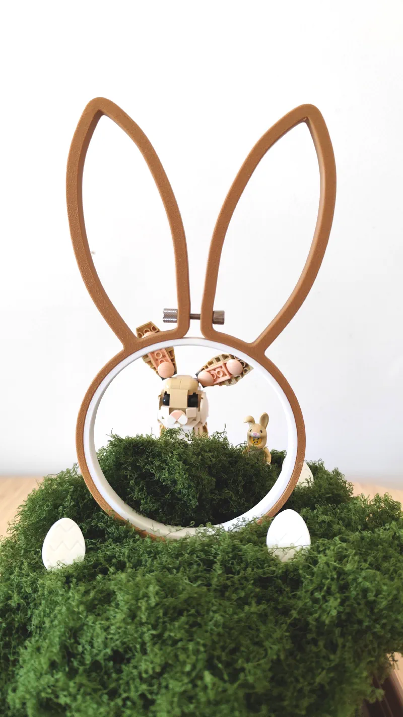 3D printed bunny style embroidery hoop close-up in front of Lego bunny.