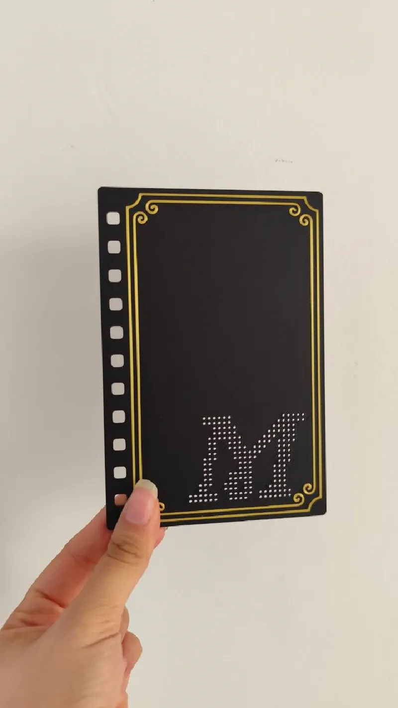 Small notebook cover with stitchable cursive M.